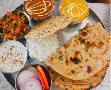 DAL+ SHAHI PANEER + MIX VEG + RAITA + SALAD + 1 LACHA PRANTHA + 2 ROTI